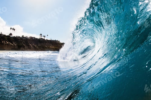 Preview: Surface level view of rolling ocean wave and coastline. Encinitas, California, USA
