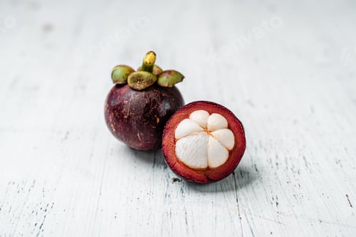 Preview: Fresh Mangosteen Fruit on a Wooden Background