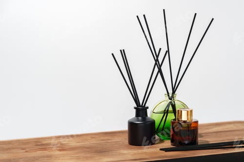Preview: Black And Brown Glass Reed Diffuser Bottles On Wooden Surface