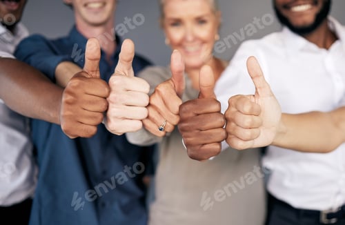 Preview: Shot of a group of workers showing a thumbs up in a office