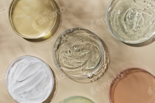 Preview: Different skincare products in Petri dishes and shadow on yellow background