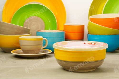Preview: Set of colored ceramic dishware front view