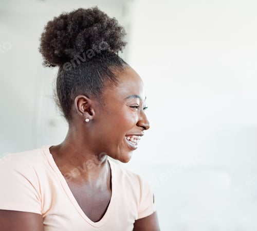 Preview: Smiling Woman in a Pink Shirt Looking Sideways