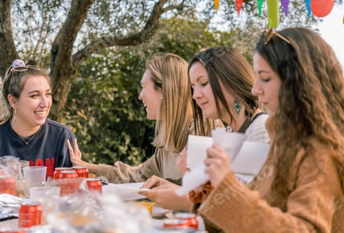 Preview: A group of women talking and laughing while drinking beer at a party