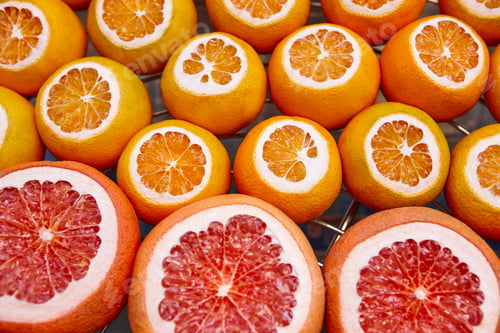Preview: Oranges and grapefruits. Fresh fruits background. Street market place