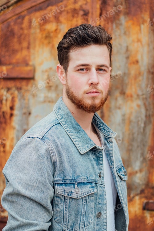 Preview: Shallow focus shot of a young and attractive male posing at camera