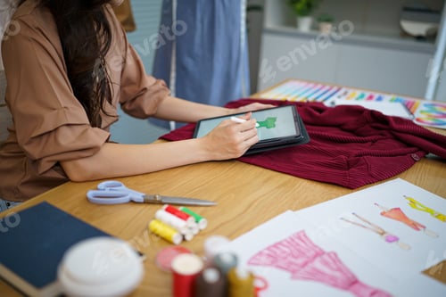 Preview: Tailor woman working in tailor shop Stylish Fashion designer tailor in workshop studio