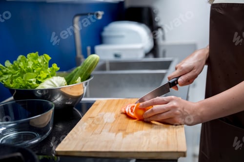 Preview: Asian woman making healthy food salad To take care health eat food