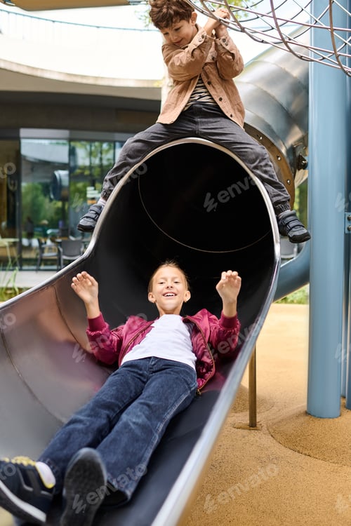 Preview: Joyful moments of childhood play on a sunny autumn day in a vibrant playground scene