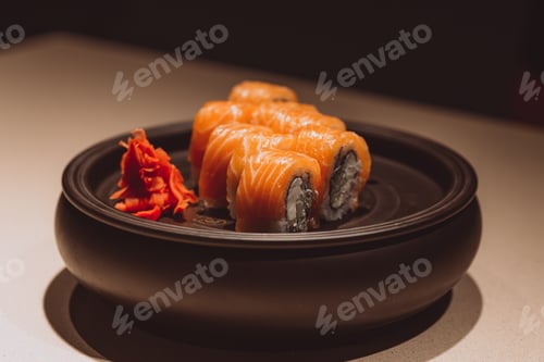 Preview: The chef prepares Japanese rolls with fish