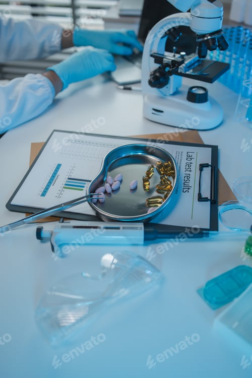 Preview: a scientist is testing various pills in order to improve their quality an effectiveness in the labor
