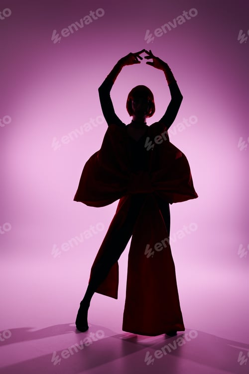 Preview: Stunning Young Drag Queen Posing Elegantly Against a Vibrant Pink Background