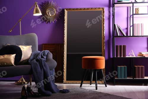 Preview: Large mirror and comfortable sofa in living room. Interior design