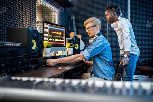 Preview: Sound Engineers Work On Music Mix In Studio