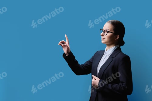 Preview: Female student touching on virtual screen, blue copy space background