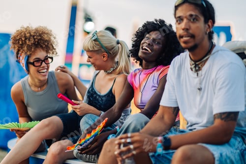 Preview: Young people having fun at music festival
