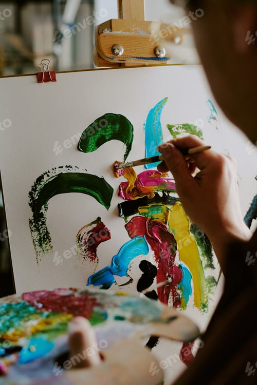 Preview: Unrecognizable Person Painting On Canvas