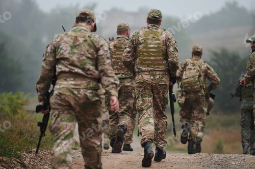 Preview: A disciplined and specialized military unit, donned in camouflage, strategically patrolling and