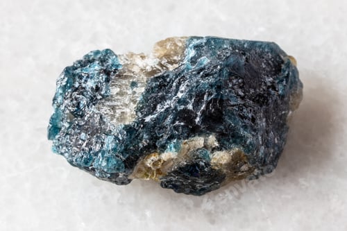 Preview: sample of unworked grandidierite mineral on white