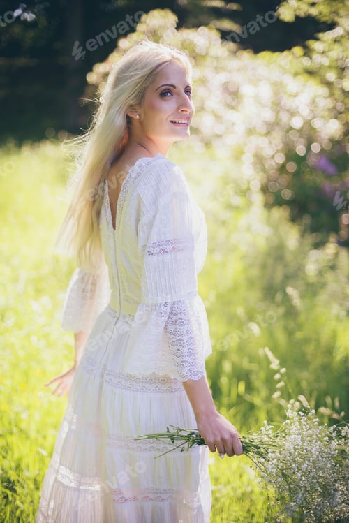 Preview: Smiling Bride In Forest Looking Over Shoulder