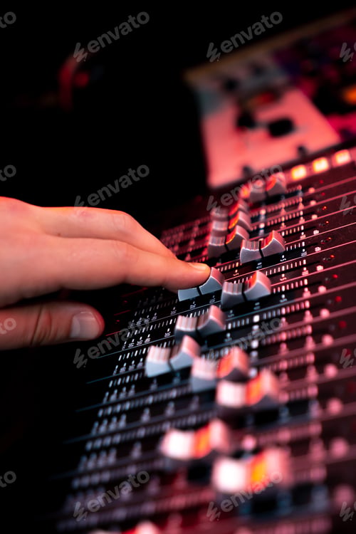 Preview: close up the recording room dark with neon lighting in the studio the sound engineer works with the