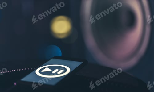 Preview: Phone with music listening icon on screen on dark background, copy space.