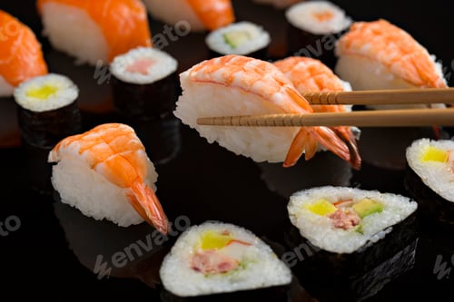 Preview: Sushi close-up, Japanese food on black background.