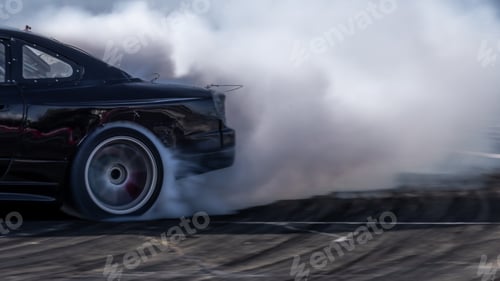 Preview: Car drifting, Blurred image diffusion race drift car with lots of smoke from burning tires.