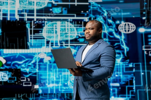 Preview: Black businessman using smart technology to interact with cybernetic platforms