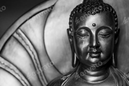 Preview: Closeup shot of a silver Buddha sculpture