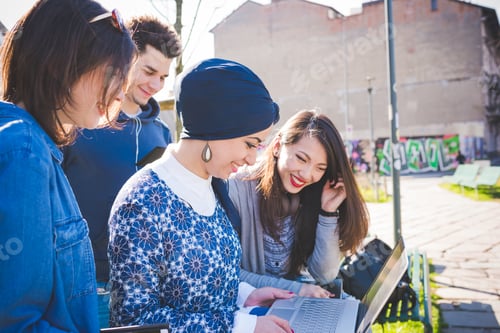 Preview: Multiracial group young people using computer