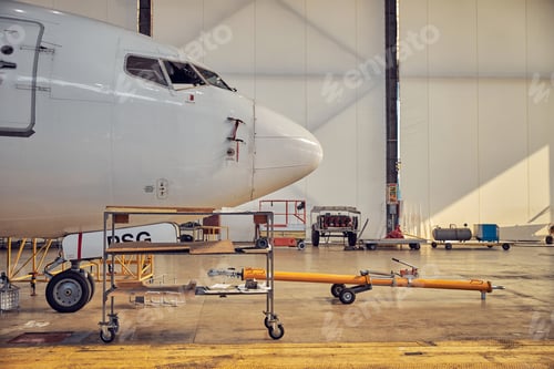Preview: Passenger aircraft in the hangar on the service
