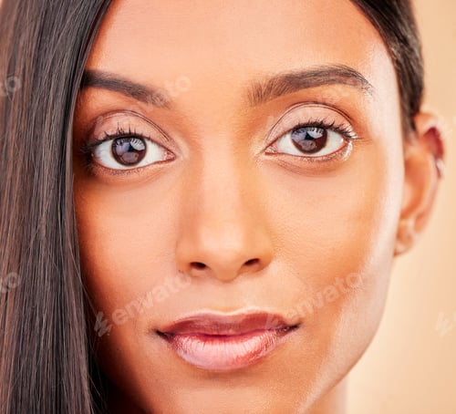 Preview: Beauty, makeup and portrait of woman in a studio with self care, glamour and face routine. Health,