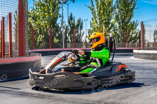 Preview: Person driving kart on a outdoor racing track