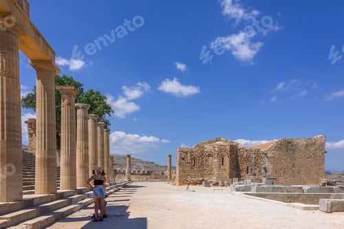 Preview: Panoramic view of ruins of ancient city of Lindos on colorful island of Rhodes, Greece. Famous