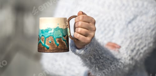 Preview: girl with a cup in hands