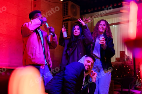 Preview: Friends enjoying a night out with drinks at a vibrant bar during a lively evening gathering
