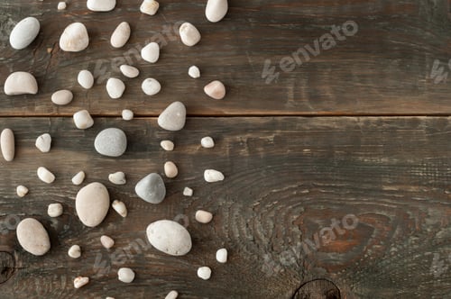 Preview: Sea stones on wooden background