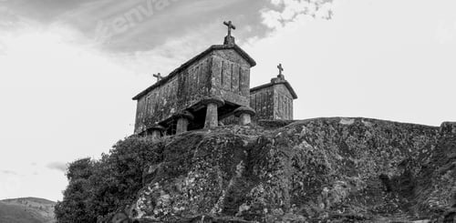 Preview: Grayscale shot of traditional old stone granaries in Soajo, Portugal