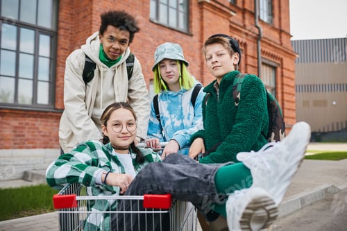 Preview: Multiethnic teenagers having fun outdoors