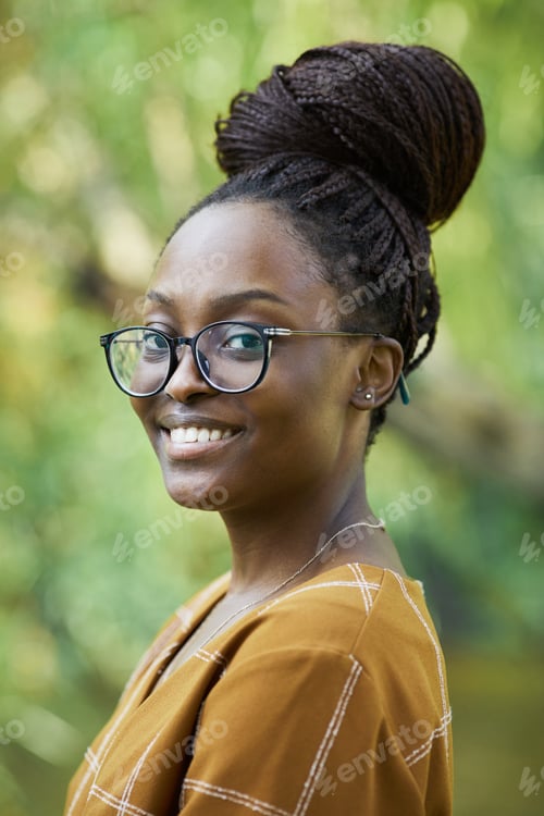 Preview: Smiling African American Woman Outdoors