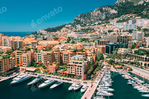 Preview: Monaco, Monte Carlo. Yachts Moored Near City Pier, Jetty In Sunn
