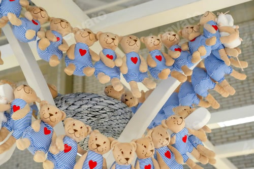 Preview: Lots Of Plush Toys. Soft Bear Figures. In Striped Clothes.
