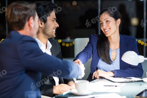 Preview: Businessman Shaking Hands With A Colleague In The Office