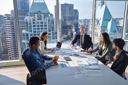 Preview: International happy professional business team at group office meeting.