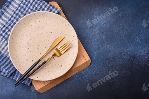 Preview: Round empty colored ceramic plate on concrete texture background