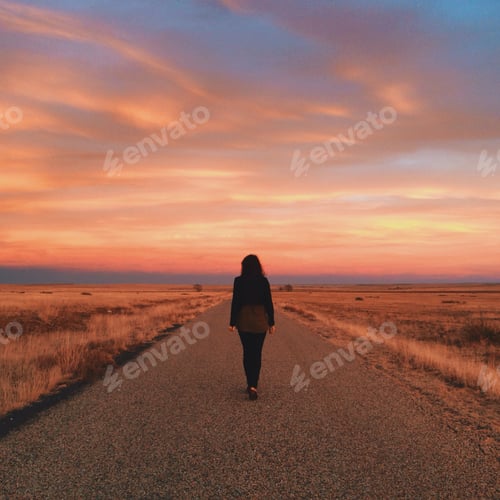 Preview: Sunset Woman Walking Down a Road