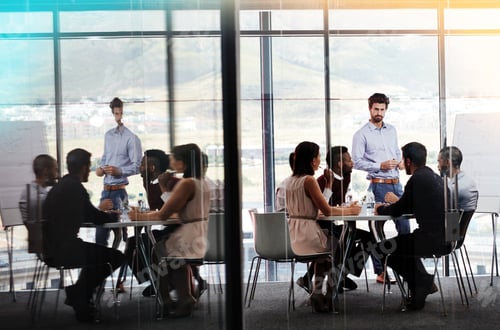Preview: Shot of a businessman giving a whiteboard presentation to a group of colleagues in a boardroom