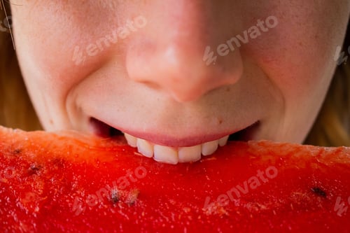 Preview: Woman eats watermelon