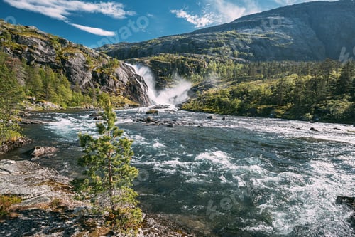 Preview: Kinsarvik, Hordaland, Norway. Waterfall Nykkjesoyfossen In Hardangervidda Mountain Plateau. Summer